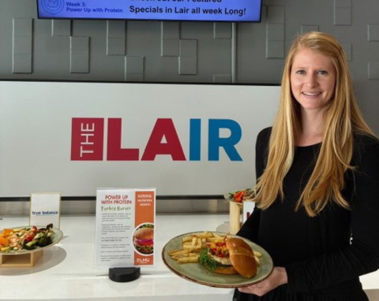 Campus dietitian with food.